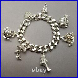 Vintage Solid Sterling Silver Charm Bracelet Hallmarked 1974 18cm (7) 75.3g