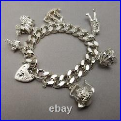 Vintage Solid Sterling Silver Charm Bracelet Hallmarked 1974 18cm (7) 75.3g