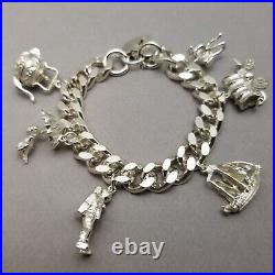 Vintage Solid Sterling Silver Charm Bracelet Hallmarked 1974 18cm (7) 75.3g