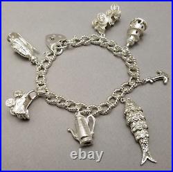 Vintage Solid Sterling Silver Charm Bracelet Hallmarked 1976 55.7g 19cm (7.5)