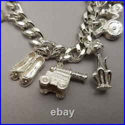 Vintage Solid Sterling Silver Charm Bracelet Hallmarked 1978 18cm (7) 62.9g