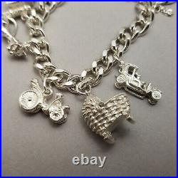 Vintage Solid Sterling Silver Charm Bracelet Hallmarked 1978 18cm (7) 62.9g