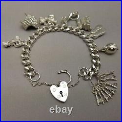 Vintage Solid Sterling Silver Charm Bracelet Hallmarked 1978 18cm (7) 62.9g