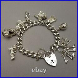 Vintage Solid Sterling Silver Charm Bracelet Hallmarked 1978 18cm (7) 62.9g