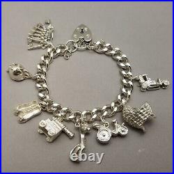 Vintage Solid Sterling Silver Charm Bracelet Hallmarked 1978 18cm (7) 62.9g