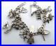 Vintage-Sterling-Silver-16-Pieces-Charm-7-5-Bracelet-46-6-Grams-01-ejua