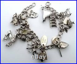Vintage Sterling Silver 16 Pieces Charm 7.5 Bracelet 46.6 Grams Vintage Sterling Silver 16 Pieces Charm 7.5 Bracelet 46.6 Grams