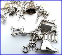 Vintage Sterling Silver 16 Pieces Charm 7.5 Bracelet 46.6 Grams Vintage Sterling Silver 16 Pieces Charm 7.5 Bracelet 46.6 Grams