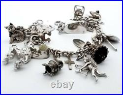 Vintage Sterling Silver 16 Pieces Charm 7.5 Bracelet 46.6 Grams Vintage Sterling Silver 16 Pieces Charm 7.5 Bracelet 46.6 Grams