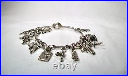 Vintage Sterling Silver 17 Charm Bracelet K041