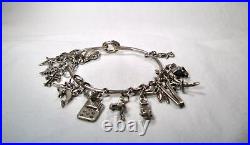 Vintage Sterling Silver 17 Charm Bracelet K041