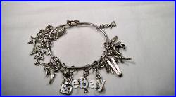 Vintage Sterling Silver 17 Charm Bracelet K041