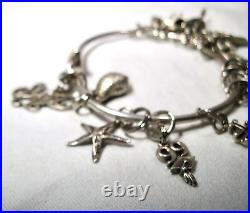 Vintage Sterling Silver 17 Charm Bracelet K041