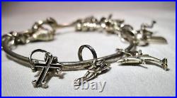 Vintage Sterling Silver 17 Charm Bracelet K041