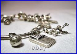 Vintage Sterling Silver 17 Charm Bracelet K041