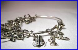 Vintage Sterling Silver 17 Charm Bracelet K041