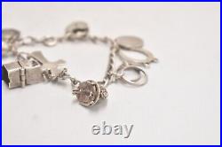 Vintage Sterling Silver Charm Bracelet 10 Charms 19cm Birmingham Hallmark