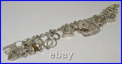 Vintage Sterling Silver Charm Bracelet & 18 Charms (7) Hallmarked 1977 (58g)
