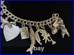 Vintage Sterling Silver Charm Bracelet 23 Charms 7.25 55.5g Animals, Symbols Vintage Sterling Silver Charm Bracelet 23 Charms 7.25 55.5g Animals, Symbols