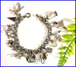 Vintage Sterling Silver Charm Bracelet 7-1/2 Lg 15 Charms 42.7 Grams Vintage Sterling Silver Charm Bracelet 7-1/2 Lg 15 Charms 42.7 Grams