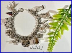 Vintage Sterling Silver Charm Bracelet 7-1/2 Lg 15 Charms 42.7 Grams Vintage Sterling Silver Charm Bracelet 7-1/2 Lg 15 Charms 42.7 Grams