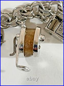 Vintage Sterling Silver Charm Bracelet 7-1/2 Lg 15 Charms 42.7 Grams Vintage Sterling Silver Charm Bracelet 7-1/2 Lg 15 Charms 42.7 Grams