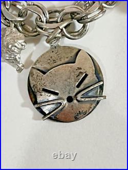 Vintage Sterling Silver Charm Bracelet 7-1/2 Lg 15 Charms 42.7 Grams Vintage Sterling Silver Charm Bracelet 7-1/2 Lg 15 Charms 42.7 Grams