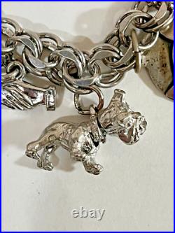 Vintage Sterling Silver Charm Bracelet 7-1/2 Lg 15 Charms 42.7 Grams Vintage Sterling Silver Charm Bracelet 7-1/2 Lg 15 Charms 42.7 Grams