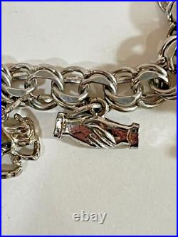 Vintage Sterling Silver Charm Bracelet 7-1/2 Lg 15 Charms 42.7 Grams Vintage Sterling Silver Charm Bracelet 7-1/2 Lg 15 Charms 42.7 Grams