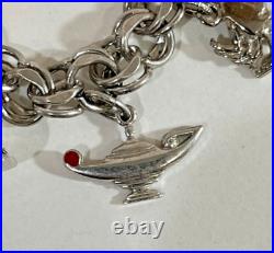 Vintage Sterling Silver Charm Bracelet 7-1/2 Lg 15 Charms 42.7 Grams Vintage Sterling Silver Charm Bracelet 7-1/2 Lg 15 Charms 42.7 Grams