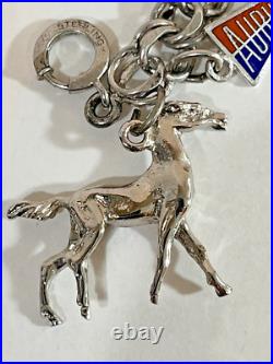 Vintage Sterling Silver Charm Bracelet 7-1/2 Lg 15 Charms 42.7 Grams Vintage Sterling Silver Charm Bracelet 7-1/2 Lg 15 Charms 42.7 Grams