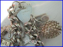 Vintage Sterling Silver Charm Bracelet Filled With 11 Charms