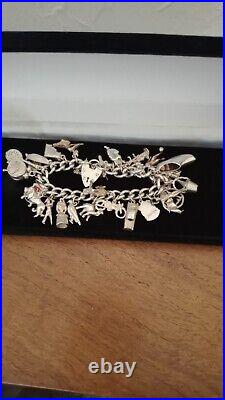 Vintage Sterling Silver Charm Bracelet Hallmarked 76.4g. Ideal 21st Present