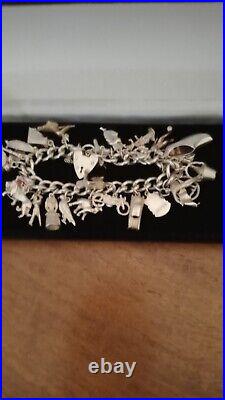 Vintage Sterling Silver Charm Bracelet Hallmarked 76.4g. Ideal 21st Present