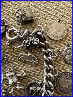 Vintage Sterling Silver Charm Bracelet With 32 Charms some rare