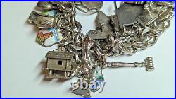 Vintage Sterling Silver Charm Bracelet With About 35 Charms Weighs 94.4 Grams