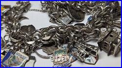 Vintage Sterling Silver Charm Bracelet With About 35 Charms Weighs 94.4 Grams