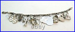 Vintage Sterling Silver Charm Bracelet with 15 Sterling Charms 7 Circa 1960s