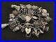 Vintage-Sterling-Silver-Charm-Bracelet-with-27-Silver-Charms-101-grams-01-zi