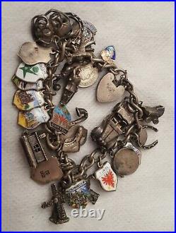Vintage Sterling Silver Charm Bracelet with 28 Charms 62 grams
