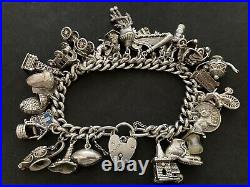 Vintage Sterling Silver Charm Bracelet with 31 Silver Charms