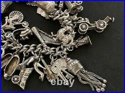 Vintage Sterling Silver Charm Bracelet with 31 Silver Charms