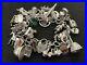 Vintage-Sterling-Silver-Charm-Bracelet-with-33-Silver-Charms-99-grams-01-mios