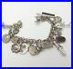 Vintage-Sterling-Silver-Charm-Bracelet-with18-Travel-Religious-Hobbies-Charms-01-yss