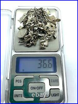 Vintage Sterling Silver Curb Link Charm Bracelet With 24 Charms 36.6 grams