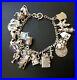 Vintage-Sterling-Silver-Heavy-Charm-bracelet-With-21-Charms-Moving-Opening-01-acv