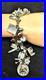 Vintage-Sterling-Silver-Loaded-Unique-Charm-Bracelet-Holiday-Money-Car-Shoe-Etc-01-ms