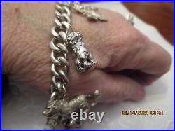Vintage Sterling silver Cuban Link charm bracelet 1 Asian charms, 8 70gm