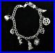 Vintage-Unique-Hand-Made-Silver-Charm-Bracelet-28grams-01-ufoh