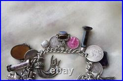Vintage Victorian / Edwardian Silver charm bracelet many charms